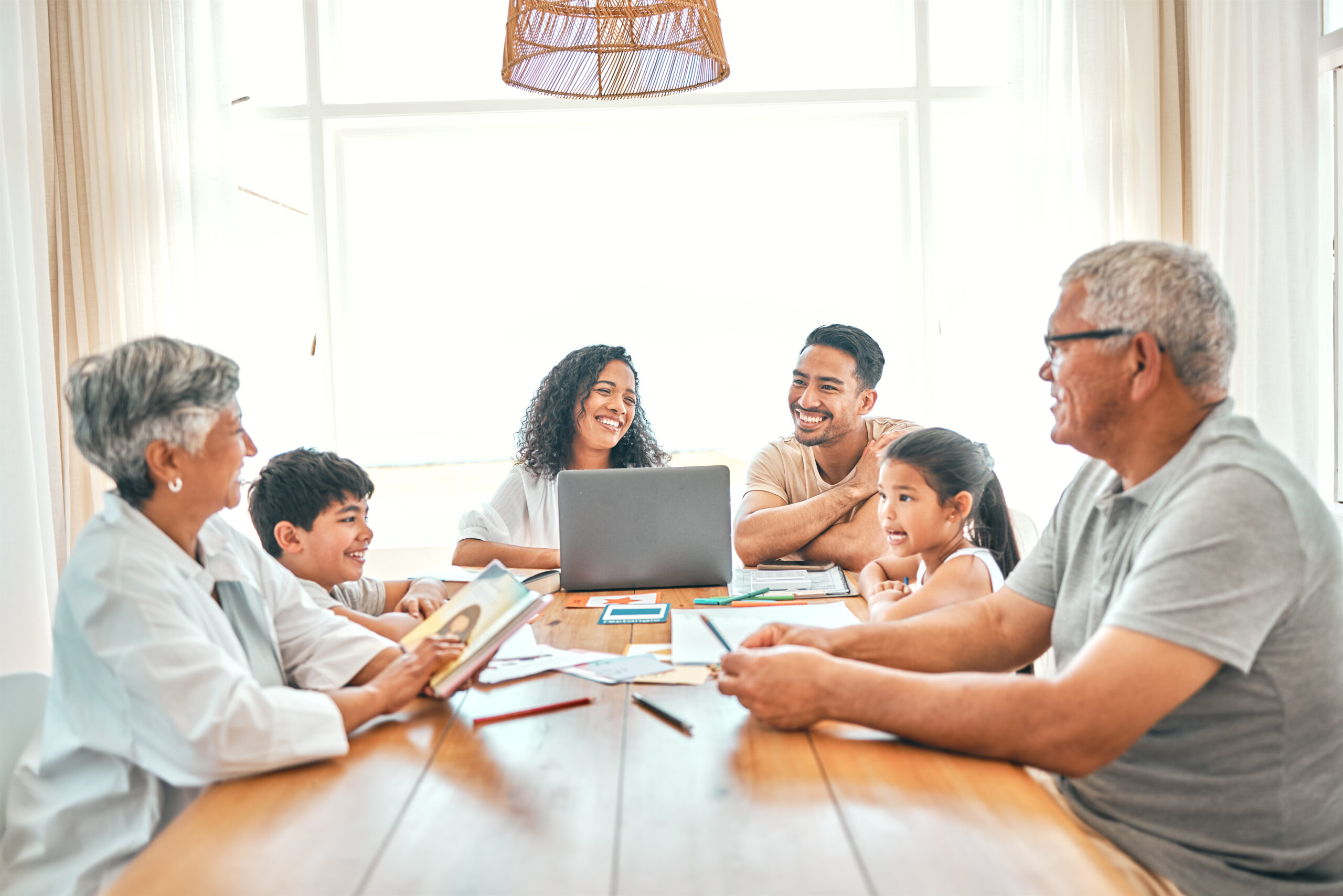 senior, black family and learning children on home laptop, reading book or storytelling help with grandparents. mexico people, mom and father with kids, online education and language development fun