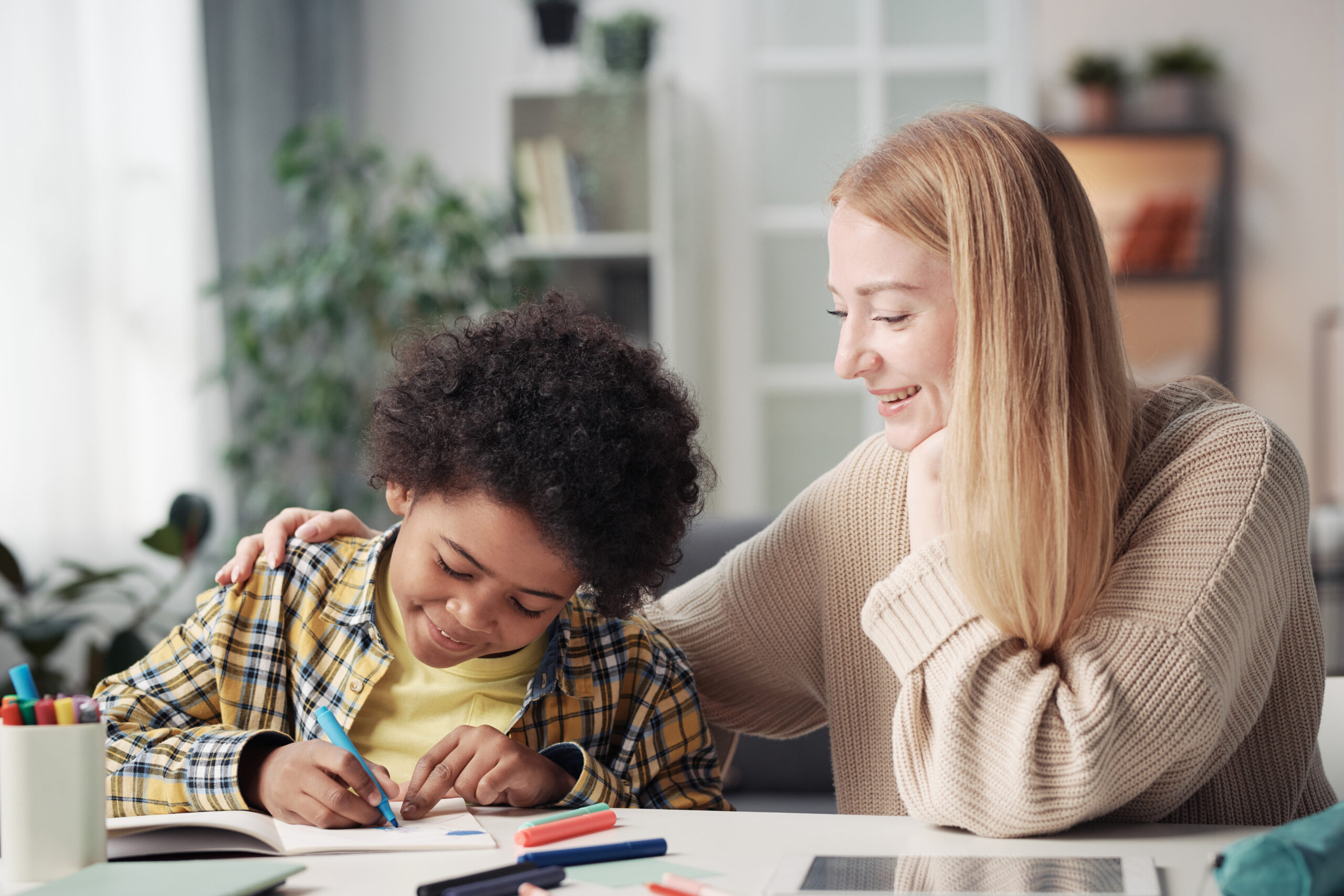 mother drawing with her adopted son
