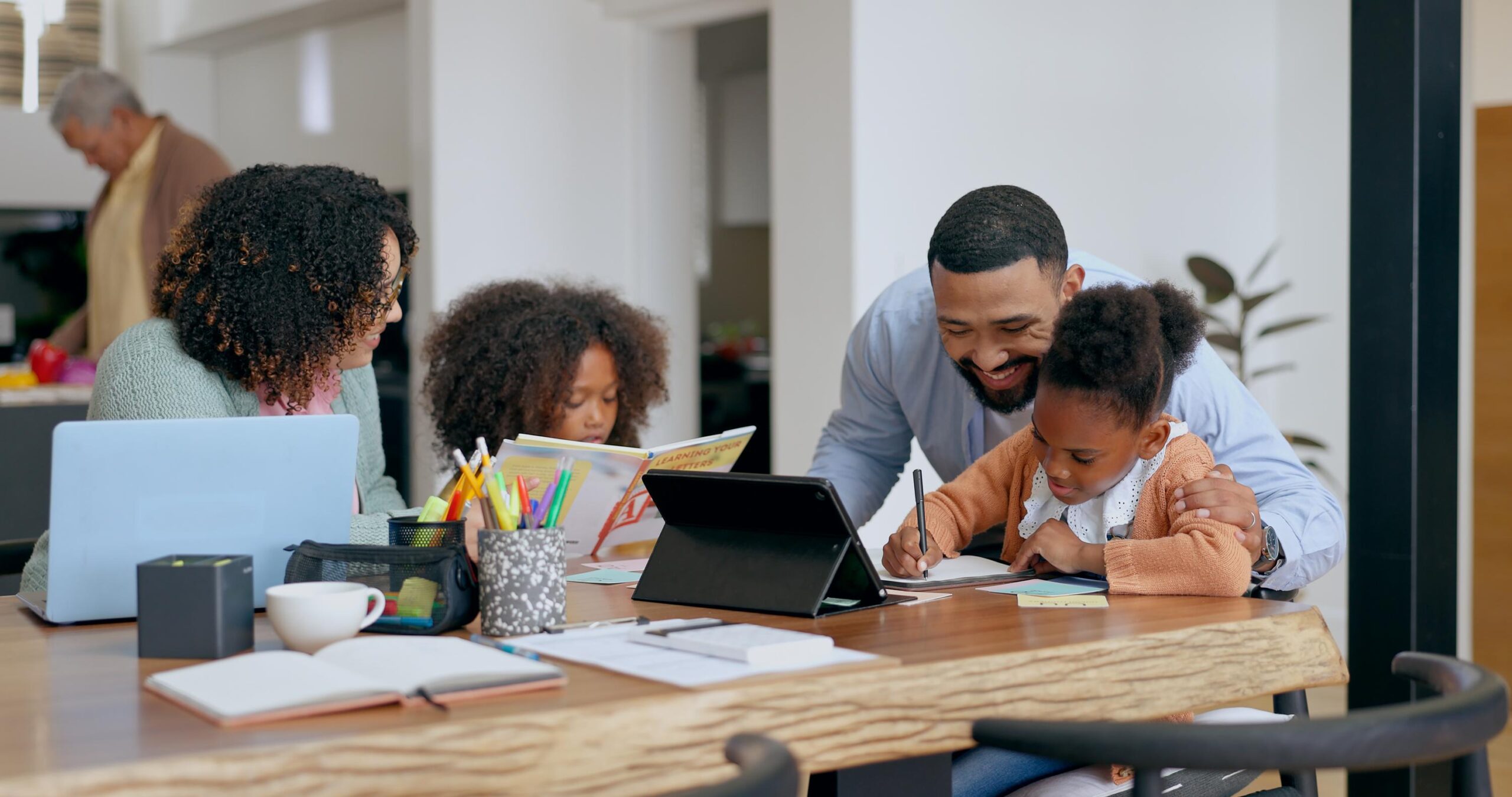 How to Choose a Flexible K-12 Learning Option That Builds Confidence, Keeps Structure, and Supports Family Balance parents, kids and e learning with tablet, writing and support for education, development and studying at desk. mother, father and children with computer, online course and home school in family house